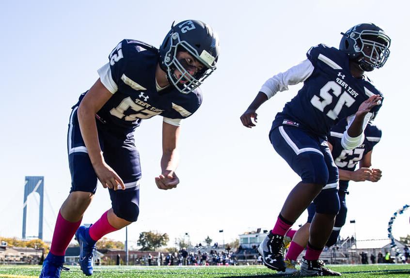 Poly Prep Varsity Football players on the field